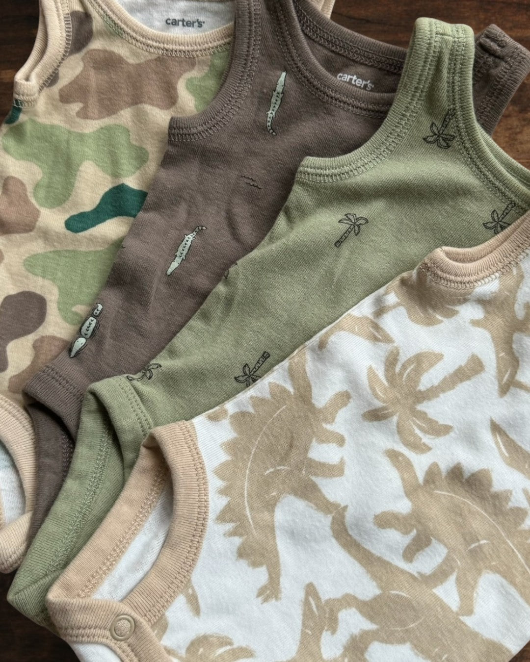 (0M) Carter’s Tank Onesie 4-pack